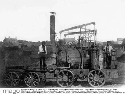 IMAGO History, Die Geburt des Eisenbahnverkehrs: 1802-1830 William Hedley s Puffing Billy at work at a colliery 1813, Eisenbahn, Zug, Bahnsteig, Schiene, Gleis, Zug, Transport, Personenbeförderung, Passagier, Bahnfahrer, bahnfahren, UnitedArchives00924051