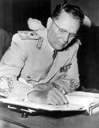 Marshal Josip Broz Tito President of Yugoslavia signs the pact of friendly help and co operation between the two states at the conclusion of his official visit to the Sudan 1959 Tito, Josip Broz, Marshal (orig. Josip Broz) Croatian Yugoslavian dictator, general, and Communist politician; 1st secretary-general of Yugoslavian Communist Party 1936-1980; prime minister of Yugoslavia 1945-1953; president of Yugoslavia 1953-1980; leader in Non-Aligned Movement _1892-1980  UnitedArchives01012824