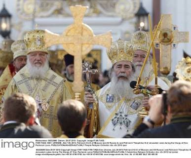 ITAR-TASS: KIEV, UKRAINE. JULY 28, 2013. Patriarch Kirill of Moscow and All Russia (L) and Patriarch Theophilos III of Jerusalem seen during the liturgy at Kiev Pechersk Lavra.  RE12399D
