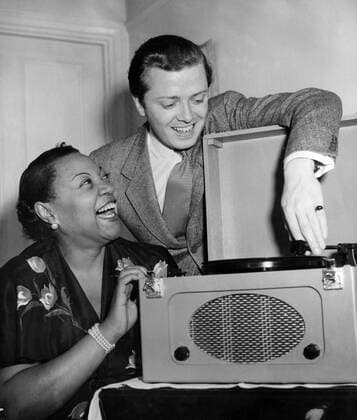 IMAGO ICONS: Sir David Attenborough Richard Attenborough on 3rd August 1950 with Rose Murphy (the Chi-chi girl) playing her latest recordings for him. Richard Samuel Attenborough, Baron Attenborough, CBE (born 29 August 1923) is an English actor, director, producer, and entrepreneur. Attenborough has won two Academy Awards, BAFTA and three Golden Globes. He is the older brother of naturalist filmmaker, Sir David Attenborough. Â  UnitedArchives01032226