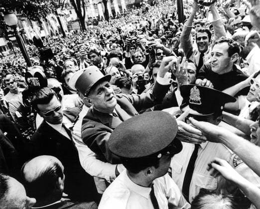 Swarms of hands reach out to greet French President Charles de Gaulle on his arrival outside Quebec City Hall, 23rd July 1967, at the start of his five-day state visit to Canada. He was greeted by rapturous crowd who waved placards advocating France-Quebec Liberty and decolonisation and peace 2nd October 1967, Freiheit  UnitedArchives01033740