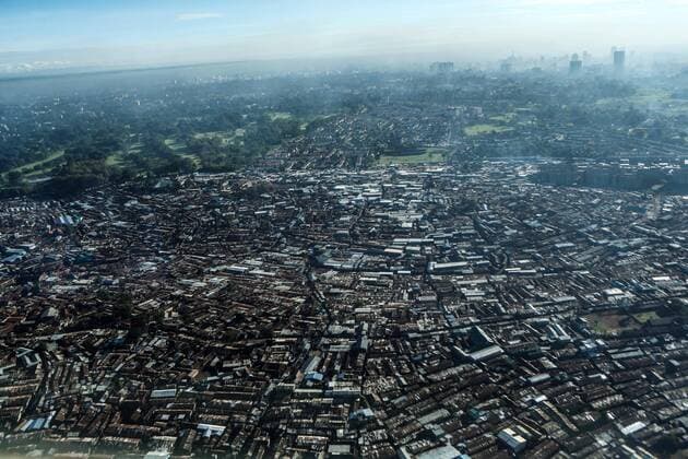 (131016) -- NAIROBI, Oct. 16, 2013 (Xinhua) -- Photo taken on May 8, 2013 shows a bird view of Kibera, one of the largest slum in East Africa, in Nairobi, capital of Kenya. Despite the declining number of people living in extreme poverty around the world over the past three decades, there are still 1.2 billion living in such conditions, one third of which are children, according to a new World Bank analysis right before the International Day for the Eradication of Poverty which falls on Oct. 17. (Xinhua Meng Chenguang)(zhf) AFRICA-INTERNATIONAL DAY FOR THE ERADICATION OF POVERTY 