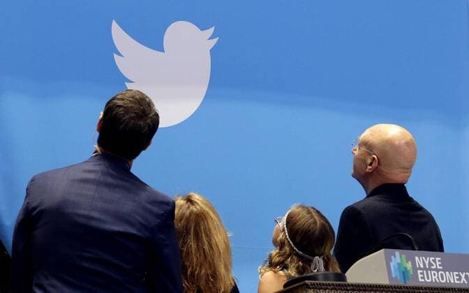 Guests of Twitter look at a camera before ringing the opening bell while waiting for shares of Twitter to be traded for the first time at the Twitter IPO on the floor of the New York Stock Exchange on Wall Street In New York City on November 7, 2013. The NYSE Euronext staged a first-ever weekend test for the initial public offer two weeks ago to avoid reprising the problems with rival Nasdaq s systems that delayed timely orders and ruined Facebook s debut on Wall Street.  NYP20131107115