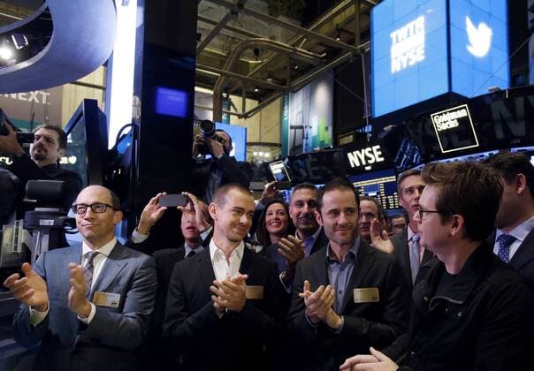 Twitter CEO Dick Costolo, Twitter co-founder Jack Dorsey, Twitter co-founder Evan Williams and Twitter co-founder Biz Stone react at the ringing of the opening bell before shares of Twitter are traded for the first time at the New York Stock Exchange on Wall Street In New York City on November 7, 2013. The NYSE Euronext staged a first-ever weekend test for the initial public offer two weeks ago to avoid reprising the problems with rival Nasdaq s systems that delayed timely orders and ruined Facebook s debut on Wall Street.  NYP20131107114