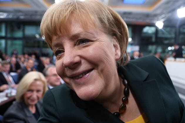 (131209) -- BERLIN, Dec. 9, 2013 (Xinhua) -- German Chancellor Angela Merkel attends a party conference of Germany s Christian Democratic Union (CDU) in Berlin, Germany, on Dec, 9, 2013. Angela Merkel s conservative bloc of CDU voted for the alliance with the center-left Social Democratic Party (SPD) on a small party conference on Monday. (Xinhua Zhang Fan) GERMANY-BERLIN-CDU-COALITION-AGREEMENT 