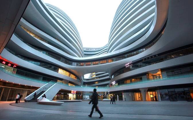 Beijing s newest architectural landmark and business complex, Galaxy SOHO, remains relatively vacant and void of shops after opening recently in China s capital, January 7, 2014. Designed by Pritzker Prize winning Zaha Hadid Architects, the development has drawn sharp criticism from Chinese academics regarding whether its design is appropriate for the city since it lends nothing to China s cultural heritage.  PEK2014010703