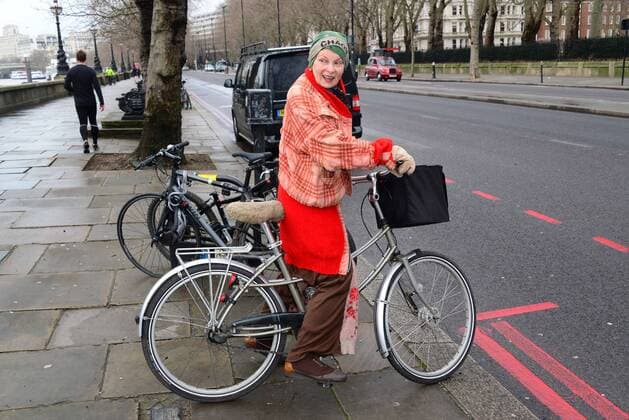 Dame Vivienne Westwood leaves on her bike after attending anti-fracking press conference. Fashion designer joins Prisca Merz, volunteer director of End of Ecocide in Europe, at a joint press conference to explain the environmental damage caused by controversial shale gas fracking technology as proposed by multi-national company Total on HMS President, Victoria Embankment, n London, England on Wednesday, 15th January 2014. Picture by Nils Jorgensen i-Images NilsxJorgensenx xi-Images  IIM-1278-0021