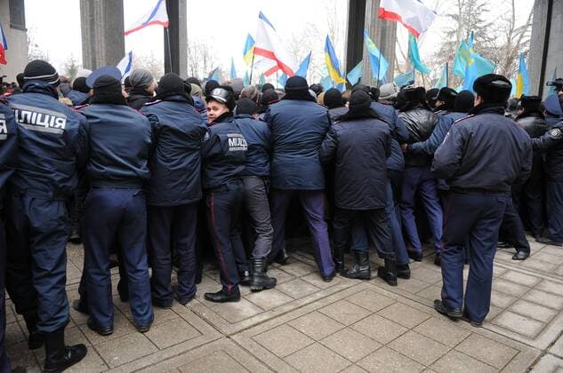 Demonstration against separatism in Simferopol Protesters against separatism at a meeting in Simferopol. Participants in a rally in front of the Crimea s Supreme Council building on February 26, 2014 in Simferopol, Ukraine. EN_01118419_0018 