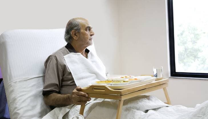 Patient looking out of a window 