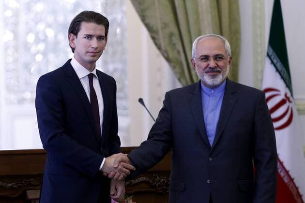 Iranian Foreign Minister Mohamad Javad Zarif (R) shakes hands with his Austrian counterpart Sebastian Kurz (L) after their joint press conference in Tehran, Iran, April 27, 2014. AustriaâÄ?s President Heinz Fischer is expected to pay a visit to Iran in the near future, first head of a western state to visit Iran for many years.  IRN20140427107