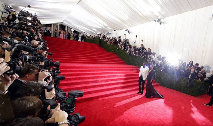 Jay-Z and Beyonce arrive on the red carpet at the Costume Institute Benefit celebrating the opening of Charles James: Beyond Fashion and the new Anna Wintour Costume Center at the Metropolitan Museum of Art in New York City on May 5, 2014.  NYP20140505121