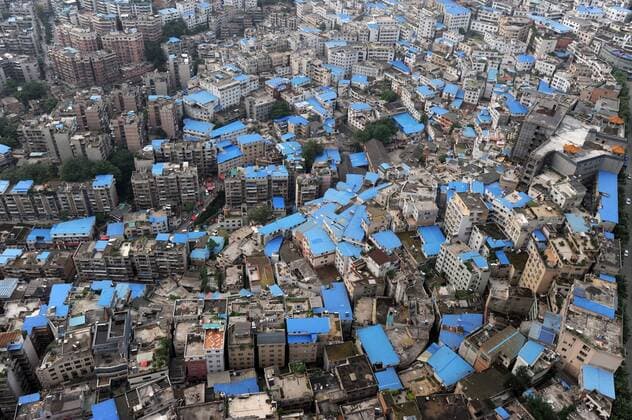 GUIYANG, CHINA - MAY 14:(CHINA OUT) General view of air shanty town on May 14, 2014 in Guiyang, Guizhou Province of China. The air shanty town is actually a set of unauthorized structures densely built on the roof of residential buildings, which are covered with colored metal sheet.  CFP452383563