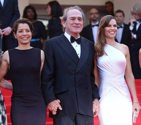 Tommy Lee Jones (C), Hilary Swank (R) and guest arrive on the steps of the Palais des Festivals before the screening of the film The Homesman during the 67th annual Cannes International Film Festival in Cannes, France on May 18, 2014.  CAN20140518842