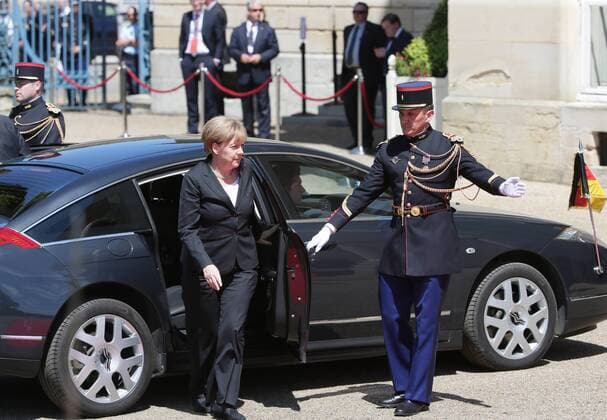 ITAR-TASS: BENOUVILLE, FRANCE. JUNE 6, 2014. German Chancellor Angela Merkel arrives at Benouville Castle (Chateau de Benouville) for the celebrations marking the 70th anniversary of the Allied Forces D-Day landings in Normandy.  RE146620