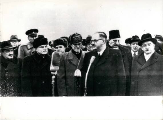 Apr. 04, 1955 - Chancellor Raab arrived in Moscow: On April 11,55 the Austrian chancellor Raab (Raab) arrived with a delegation of the government for political discussions at the main airport of Moscow. The Austrian guests were greeted at the airport by ministers and political personalities of the Soviet government. Photo shows Chancellor Raab (before the microphone) just after his arrival there, W.M. Molotov (second from left) and A.I. Mikojan (first from left), the first secretary of the chairman of the minister assembly of the USSR.  - ZUMAk09