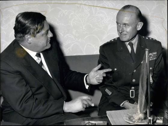 Oct. 30, 1956 - Departing Supreme Commander of NATO, General Gr?nther, paid a visit to German Defense Minister Franz Josef Strauss in Bonn. He was greeted at Wahn airport by Ehren Company and subsequently by Defense Minister Franz Josef Strauss. Tomorrow he will see Federal President Heuss and Chancellor Dr. Adenauer. Pictured: General Gr?nther(left) in the Bonn Defense Ministry with Defense Minister Franz Josef Strauss.  - ZUMAk09
