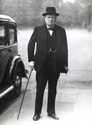 May 10, 1940 - London, England, U.K. - Sir WINSTON CHURCHILL (November 30, 1874 - January 24, 1965) was Prime Minister of the United Kingdom as well as Chancellor of the Exchequer. PICTURED: Churchill newly crowned British PM with top hat and cigar at No. 10 Downing St. London United Kingdom  - ZUMAk09