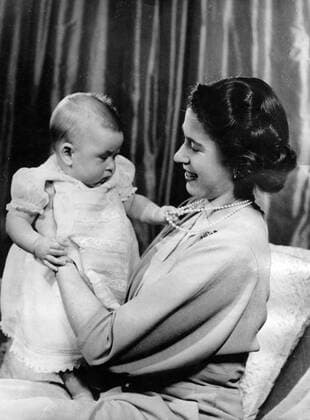 Apr. 9, 1949 - London, England, U.K. - The elder daughter of King George VI and Queen Elizabeth, ELIZABETH WINDSOR (named Elizabeth II) became Queen at the age of 25, and has reigned through more than five decades of enormous social change and development. PICTURED: QUEEN ELIZABETH II holding baby CHARLES. London United Kingdom  - ZUMAk09