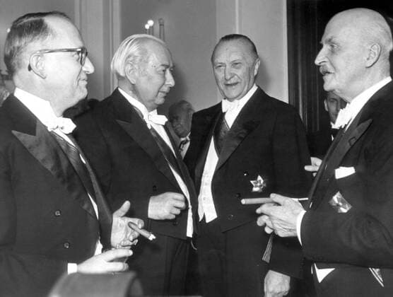 Jan. 31, 1954 - Bonn, Germany - West Germany s first chancellor KONRAD ADENAUER began his career in politics as a member of the Cologne City Council, becoming lord mayor of the city. Adenauer was elected Chancellor of the Federal Republic of Germany on 15 September 1949. PICTURED: Prof. Dr. WALTER HALLSTEIN, Prof. Dr. THEODOR HEUSS, Adenauer and ERNST MECKLENBURG during a reception in Villa Hammerschmidt. Bonn Germany  - ZUMAk09