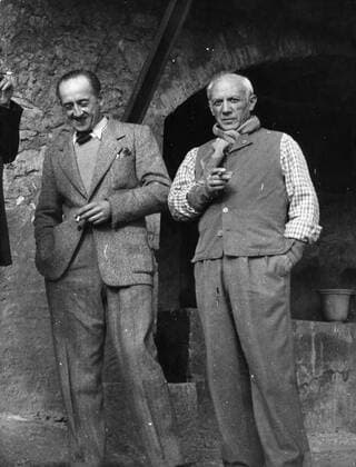 Oct. 27, 1954 - Paris, France - Artist PABLO PICASSO with friend M. RAMIER, in front of the entry to The Pottery of Vallauris. Paris France  - ZUMAk09