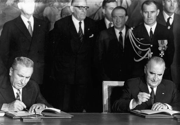 May 8, 1960 - Location Unknown - EDWARD GIEREK (1913-2001) was a communist politician. He served as First Secretary of the Polish United Workers Party for almost ten years. PICTURED: Edward Gierek signing documents with GEORGES POMPIDOU.  - ZUMAk09