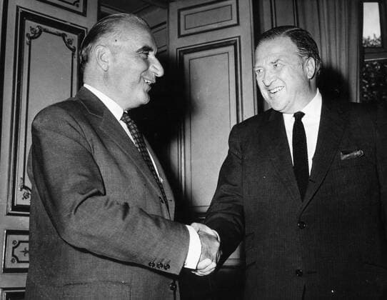 Aug. 5, 1960 - Detroit, Michigan, USA - HENRY FORD II (1917-1987), commonly known as HF2 and Hank the Deuce , was the son of Edsel Ford and grandson of Henry Ford. He was president of the Ford Motor Company from 1945 to 1960, chairman of the board and chief executive officer (CEO) from 1960 to 1979. PICTURED: Henry shakes hands with President of the French Republic GEORGES POMPIDOU. Detroit USA  - ZUMAk09