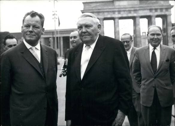 Aug. 08, 1961 - German Federal Minister of Economics visiting Berlin: Driving along the border between East and West Berlin, the German Federal Minister of Economics, Prof. Ludwig Erhard, also inspected the part of the border at the Brandenburg Gate.He was accompanied by the Ruling Mayor of Berlin, Willy Brandt (left), on Aug.25th.  - ZUMAk09