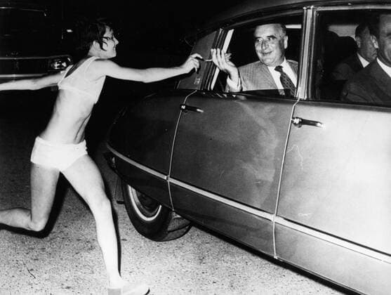 Apr. 5, 1962 - London, England, U.K. - GEORGES POMPIDOU (1911-1974) was a French politician who served as Prime Minister of France and President of the French Republic from 1969 until he died in 1974. PICTURED: Georges Pompidou being chased by a young girl. London UK  - ZUMAk09