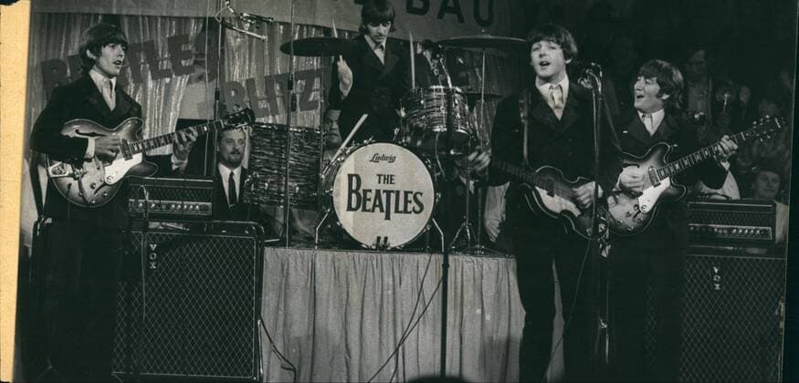 Jun. 06, 1966 - The Beatles are pictured performing in the Circus Krone in Munich. Berlin Mayor Dr. Schreiber toasts flight passengers.  - ZUMAk09
