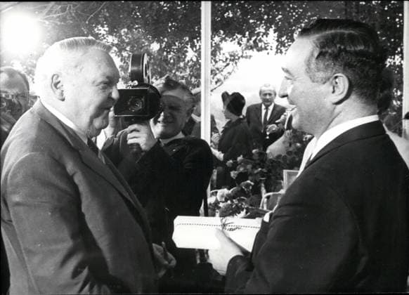 Oct. 10, 1966 - Dr. Erich Mende is 50. years old. One day after the Koalitionskrise (government-crisis) at Bonn (this was on oct. 27th) Dr Erich Mende could celebrate his 50th birthday. Dr Mende, who was Vice-Chancellor and German Minister for East-West-German questions and resigned on October 27th from these two positions in connection with the Household-Problems of the Government, is the leader of the FDP (Freie Demokratische Partei). Together with Dr. Erich Mende also the three Further Ministers of the FDP-Bucher, Scheel and Dahlgrun-resigned during the congratulation-cour for Erich Mende on Oct. 28th, in Bonn also Chancellor Prof. Ludwig Erhard was present. Our picture shows: Chancellor Erhard congratulating Erich Mende with a present.  - ZUMAk09