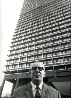 Feb. 14, 1969 - Sky Scraper for members of Bonn Parliament : During the days when Eugen Gerstenmaier was still president of the parliament, this sky scraper with 29 floors has been planned. It was called the long Eugen . But now another man has become president Kai -Uwe Von Hassel. He is the new landlord and with the change of persons, the name of the house changed as well. It is now called simply Uns Uwe . The sky-scraper has a total of 446 rooms for all the MP s as well as a hearing hall, rooms for the different committees, and a cafeteria in the last floor. The building costs amounted to 48 million mark with additional 4 millions for the i~~~e equipment. Photo shows The new president of parliament Kai-Uwe Von Hassel in front of the new sky - scraper for the MP s . The house is situated in the Gronau at Bonn.  - ZUMAk09