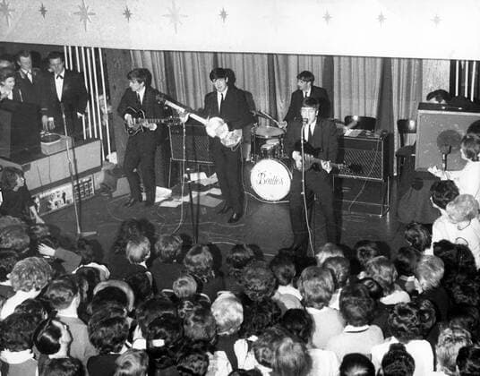 July 14, 1969 - London, England, U.K. - THE BEATLES with BRIAN EPSTEIN. From left to right are, GEORGE HARRISON, PAUL MAcCARTNEY, RINGO STARR and JOHN LENNON performing on stage. London United Kingdom  - ZUMAk09