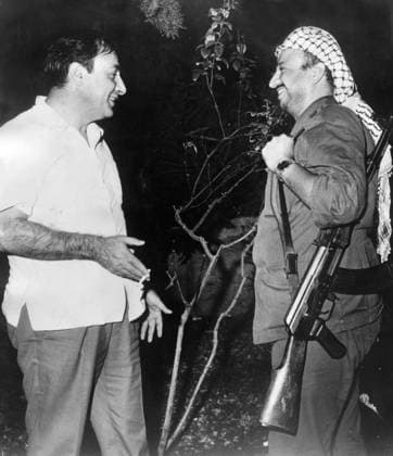 Jan. 1, 1970 - Amman, Jordan - For decades YASSER ARAFAT has been the leader and figurehead of the Palestinian people s struggle for statehood. He was Chairman of the Palestine Liberation Organization, President of the Palestinian National Authority, and leader of the secular Fatah political party, which he founded 1959. Arafat spent much of his life fighting against Israel in the name of Palestinian self-determination. Originally opposed to Israel s existence, he modified his position in 1988 when he accepted UN Security Council Resolution 242. PICTURED: YASSER ARAFAT (right) and Palestinian activist KAMAL NASSER. Amman Jordan  - ZUMAk09