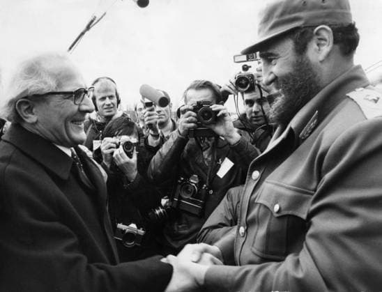 Apr 02, 1977 - Berlin, Germany - A Cuban revolutionary leader who led his country from January 1959 until his retirement in February 2008, FIDEL CASTRO transformed Cuba into the first communist state in the Western Hemisphere. Although the US has tried hard to get rid of him, President Castro outlasted no fewer than nine American presidents since he took power in 1959. He has remained Cuba s dictatorial ruler for so long that nearly three-quarters of its people have known no other leader. PICTURED: A German Communist politician ERICH HONECKER greeting FIDEL CASTRO on Berlin airport. Berlin Germany  - ZUMAk09