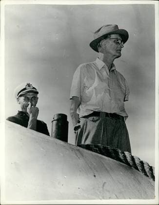 Oct. 10, 1953 - Professor Piccard makes record depth descent in Bathyscaph off coast of Italy.: Professor Auguste Piccard the 69 year old Swiss Born scientist dived to a world record depth of 10,335 feet (nearly two miles) in his Bathyscaph, the Trieste , at a point fifty miles from the Island of Ponza off the West Coast of Italy. The previous record depth was 6,889 feet set up by Commander Houot of the French Navy in the Bay of Toulon, Professor Piccard s dive was made in the Tyrrhenian Pit the deepest point of the Mediterranean Basin. Photo shows Professor Piccard seen aboard a tug after his great descent.  - ZUMAk09