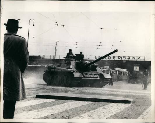 Aug. 08, 1955 - Soviet Tanks returned to Russia from Austria. Photo shows the scene as Tanks of the Russian forces arrive at the railway yard in Vienna from Lower Austria where they are being freighted back to Soviet Russia following the Freeing of Austria.  - ZUMAk09
