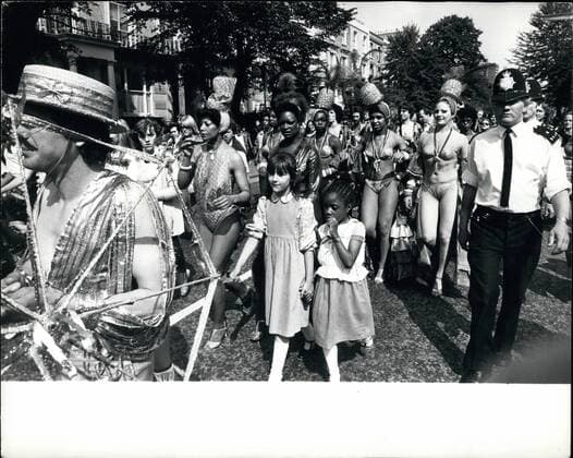 Aug. 08, 1980 - Police Join In The Fun At The Nottinghill Carnival: The annual West Indian Carnival through the streets of Noting Hill, in London, went off without much trouble this year with only a few arrests and they were for minor offenses. About 4,500 police stood by in case of trouble, but they were kept discordantly out of sight. Photo Shows The Carnival spiritual in full swing on the streets on Notting Hill, where the annual celebration by London s West Indian Community.  - ZUMAk09