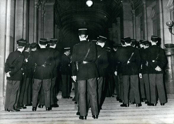 Nov. 11, 1960 - The Paris Palais Of Justice Looked like a fort: When on Nov 3rd the process began against the initiators of the riot against de Gaulle which took place in January this year in Algeria. All surroundings of the court of the Justice was secured as the process is being held at a time of great political tension in France. Picture shows Policeman in the entrance hall of the Court of Justice in Paris.  - ZUMAk09