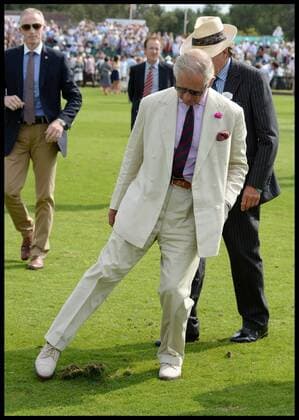 . 26 07 2014. Windsor, United Kingdom. Prince Charles treading at half time during the Coronation Cup at Guards Polo Club, Windsor Great Park  xAndrewxParsonsx xi-Imagesx IIM-2702-0012