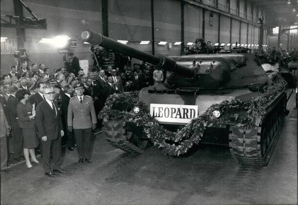 Sep. 09, 1965 - the first tank of a series.....of the German Bunderwehr called Leopard was during a ceremonial in Munich on September 9, 1965 to the German Minister of Defence, Kai-Uwe Von Hassel, German Companies got the order for the technical development. After those development Works Messrs. Krauss Maffei,Munich, has the contract for the series production. The German Bundsweshr has a tank here with - who satisfies all requirements. He is string in fire flight, quick and grants protection. He goes over graves, steps. hills and through water in full speed. The use of petrol is very little, h e can go with it for 600 km The leopard is able to dive. the arming is a 105 mm-gun including munitions which is proofed, furter two machine guns and a throw arrangement for fog. Photo Shows The tank during a demonstration on the training ground of Messr Kraus Maffei in Munich while he is le  - ZUMAk09