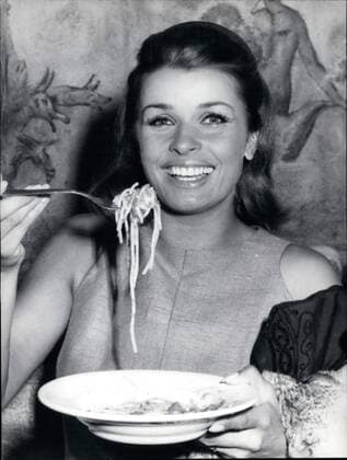 Sep. 09, 1966 - Beautiful Austrian actress Senta Berger taken today eating the spaghetti . Blonde Senta is filming the film Operation Saint Gennario the protector of Naples. Photo shows Senta Berger eating spaghetti at the Cinecitta.  - ZUMAk09