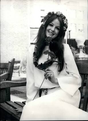 Jul. 07, 1967 - THE HIPPY CULT IN BRIDAL WEAR. The Hippy Cult is now happening in bridal wear and at Young s Dress Hire in Wardour Street, a barefest bride wearing flowers in her hair and balls round her for brides of Aurumn 67. Mr. Louis Young where idesit is to bring out this range, belived teh Hippies, a powerful effect on fashion genertally  - ZUMAk09