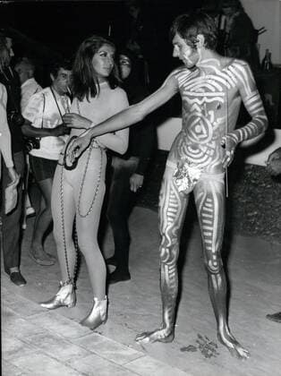 Aug. 08, 1967 - Eddie Barclay s pyschedelic party at St. Tropez: Until now France looked as if she could avoid the psychedelic craze-which is based on some Oriental touches in taste and fashions started by the Beatles, and continued by the hippies combining philosophy with hallucinatory dreams and esotheric problems. Eddie gave a startling party in St. Tropez with the theme of psychedelic atmosphere. He is director of a record company, and this not his first big folie  - ZUMAk09