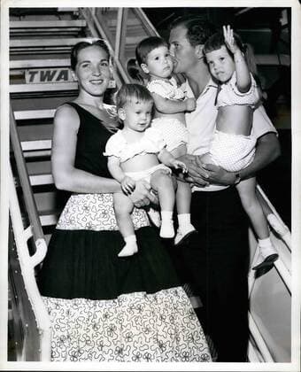 Feb. 02, 1972 - TV and Recording star Pat Boone and his wife Shirley proudly exhibit their family, Deborah Ann, 1; Linda Lee, 2, and Cheryl Lynn, 3, as they arrive from the Coast Via TWA Jetstream. Pat will prepare for his big fall tv show. Credit: TWA  - ZUMAk09