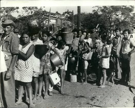 Apr. 04, 1973 - Earthquake Victims Queue For Water: Almost three weeks after the disastrous earthquake in Managua, the capital of Nicaragua, water is still in short supply and here are members of the population lining up for water in one of the streets of the capital.  - ZUMAk09