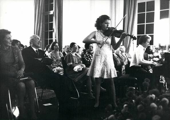 Sep. 09, 1976 - Infant Prodigy Anne Sophie Mutter: She is one of the great infant prodigys, Anne Sophie Mutter, German, 14 years old and since she was five playing piano and violin. 1970 first price at the westgerman contest Youth makes music for her piano and violin interpretations, the same price she won 1972 with her three years younger brother Christoph for their 4-hands-piano play. Actually Anne Sophie is at the Conservatorium in Winterthur with Aida Stuckias her teacher. Photo shows Anne Sophie Mutter playing during the International Music Festival in Lucrne.  - ZUMAk09