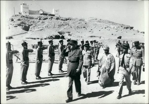 Feb. 26, 2012 - General De Gaulle in Southern Algeria: After visiting Colomb Bechar, General de Gaulle arrived at Tindouf, on the border of Mauritania, at half way from Algiers to Dakar. General de Gaulle inspecting the men of the garrison.  - ZUMAk09