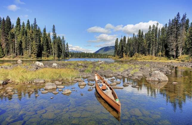 a canoe in Diamond Lagoon, Murtle Lake, Wells Gray Park, British Columbia, Canada, Darrel Giesbrecht  acp71693