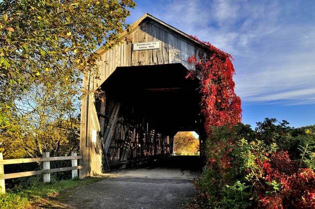 A front view of the old covered bridge crossing the Salmon river at Smith Creek New Brunswick Canada.  acp72993 Photography