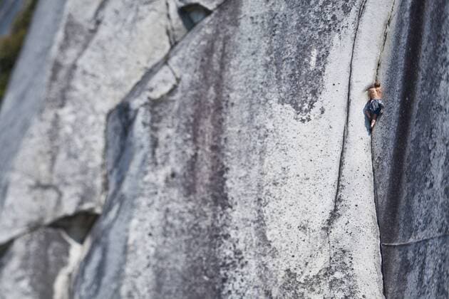A strong male climber climbing Crescent Crack 10d, Squamish, BC  acp53530 photography